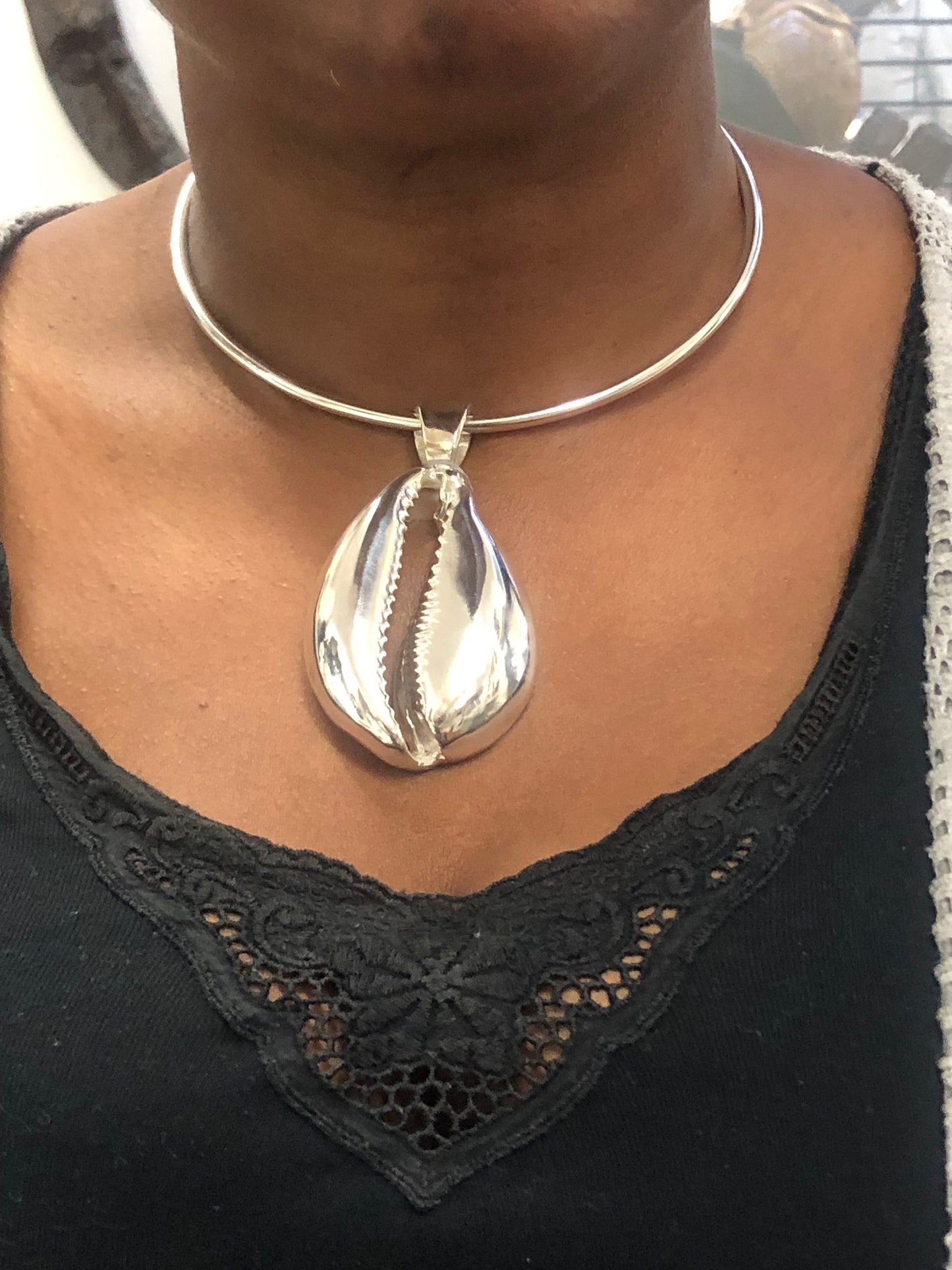 Cowrie shell pendant