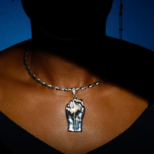 The Fist Pendant